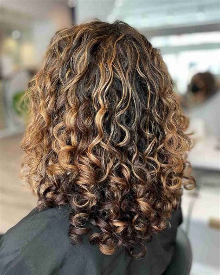 Curly Caramel Balayage: A Trendy Hair Transformation That Defines Elegance and Style